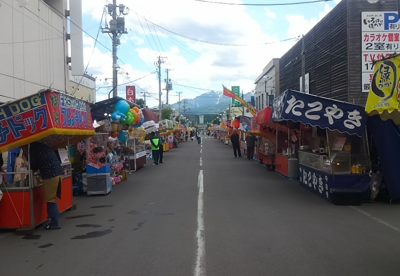 Stalls getting set up for business the first day, with Mt. Ashibetsu in the background